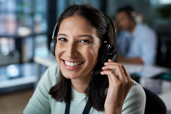 Customer service representative wearing a headset